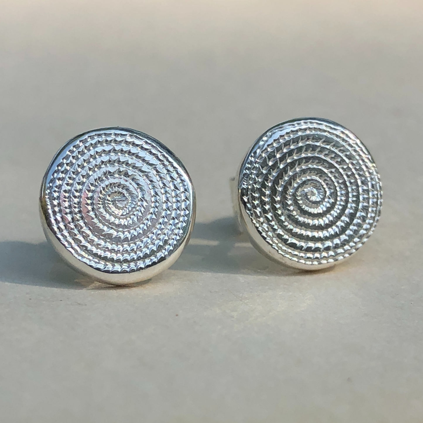 engaraved _Ndoro_stud_Earrings_by_The_Zuri_Collection_Silver_Jewellery made in zimbabwe