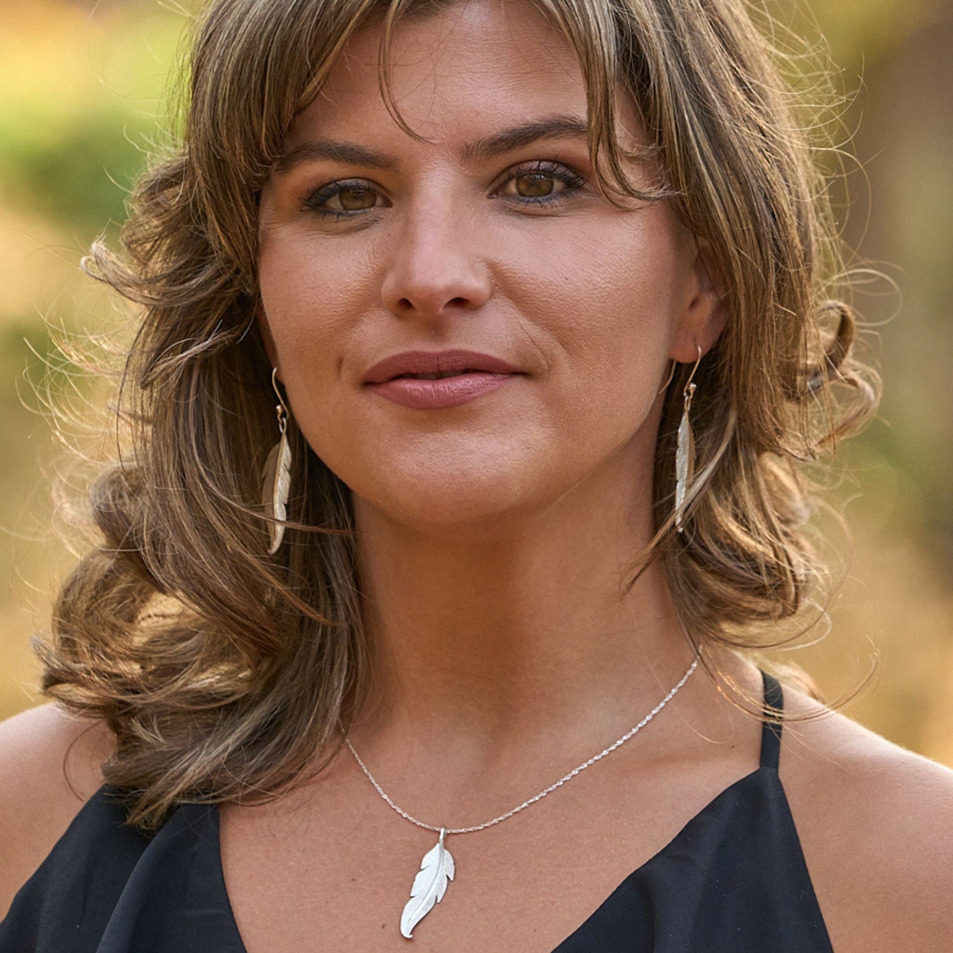 made in zimbabwe feather necklace