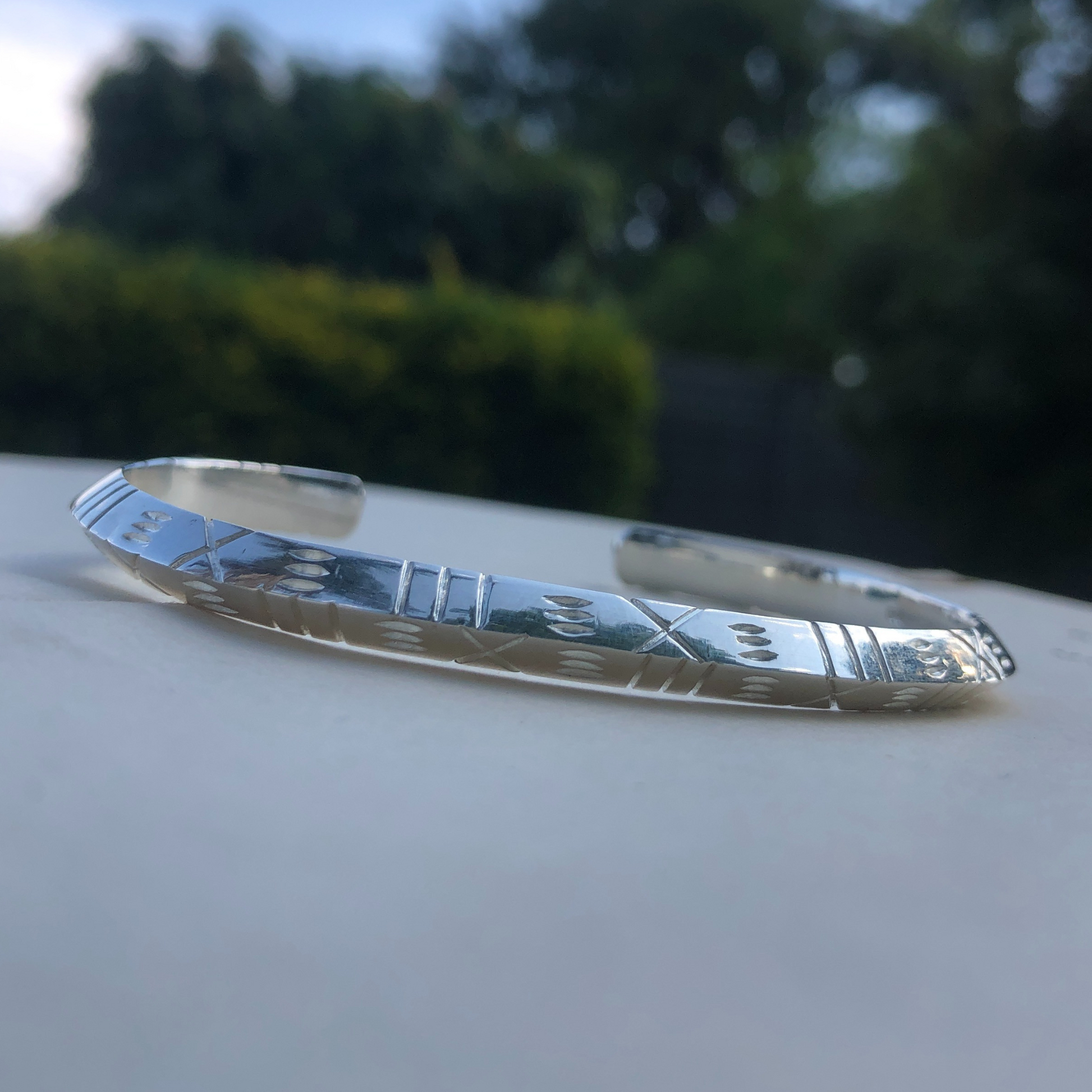 Ndebele patterns inspired triangle cuff bangle made in Africa