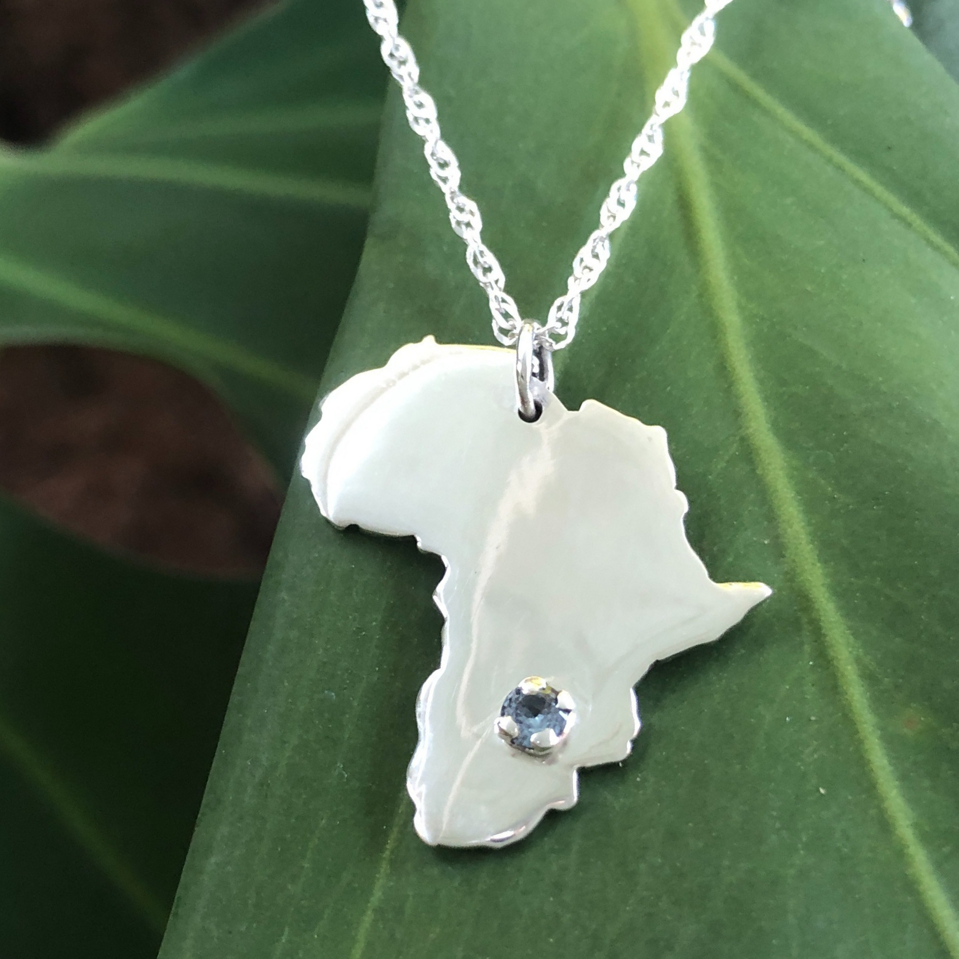African Map Necklace with a gemstone