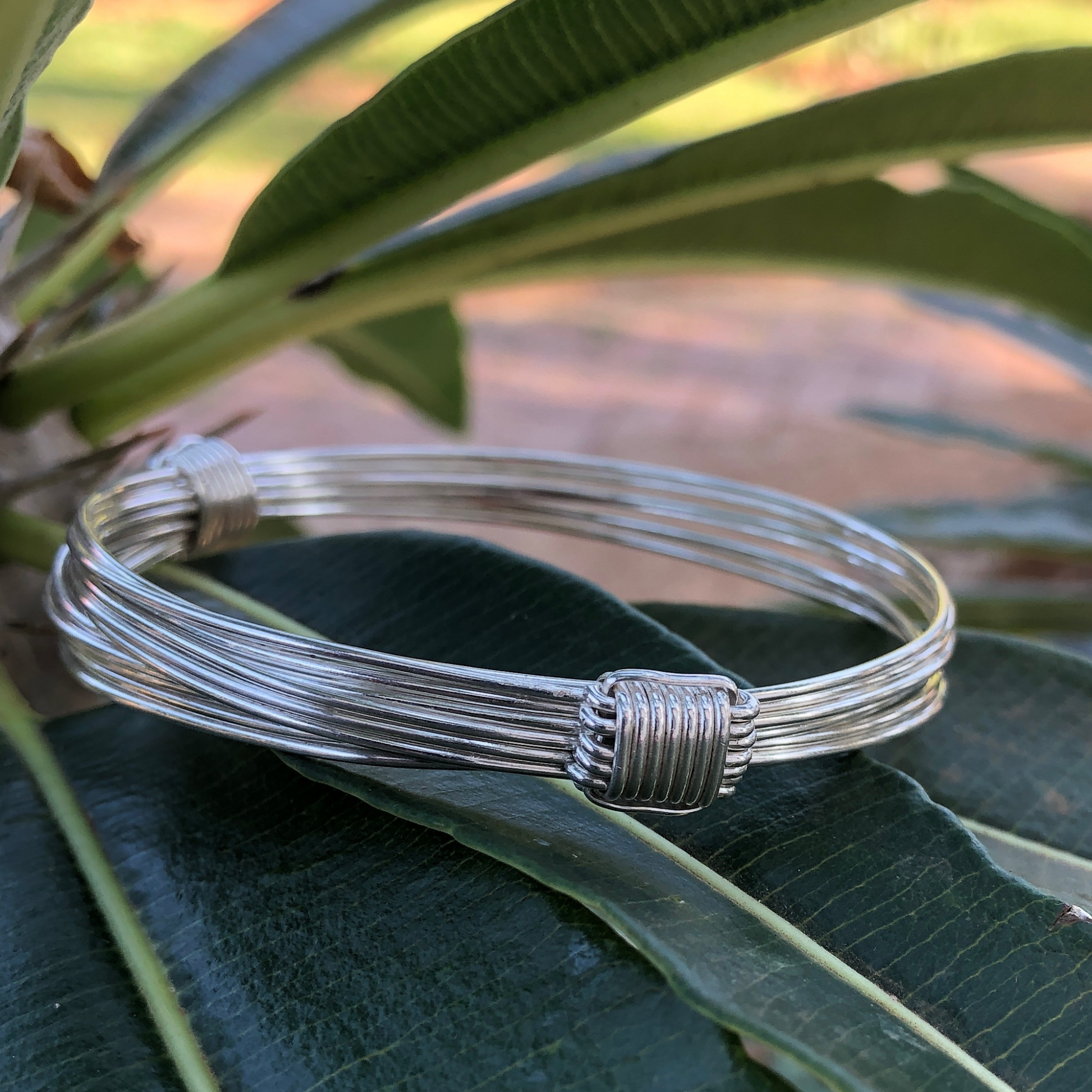 African two knot seven strand adjustable elephant hair bracelet made in sterling silver
