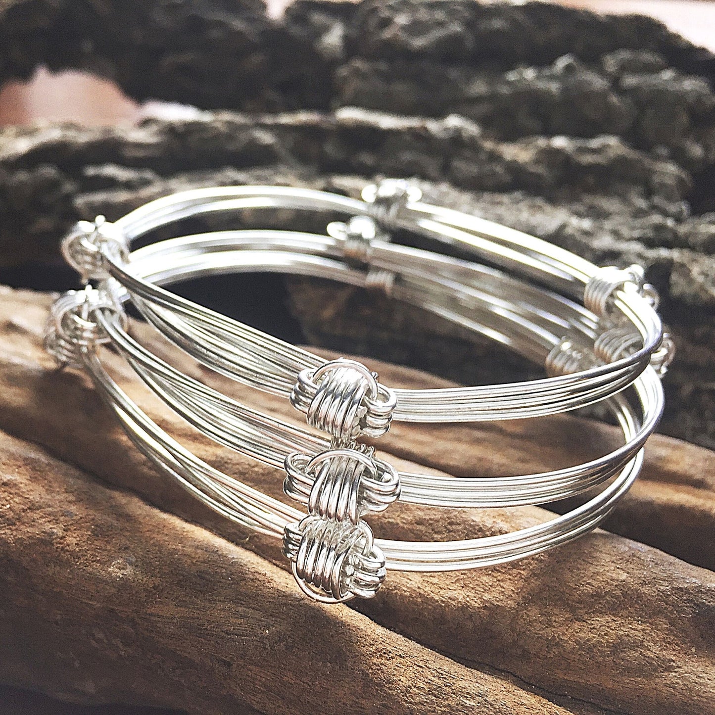 Set of three, four knot three strand Silver Elephant hair knot adjustable bangles made by the Zuri Collection , Zimbabwe, Africa