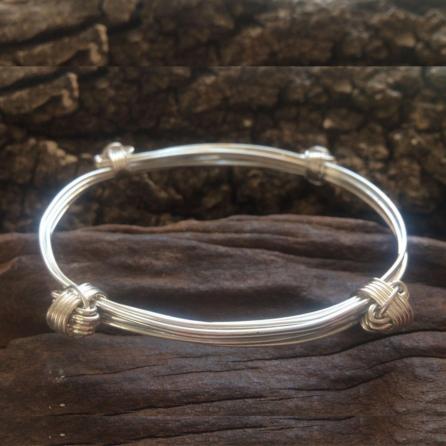 Silver four knot five strand adjustable bangle made in Zimbabwe , Africa