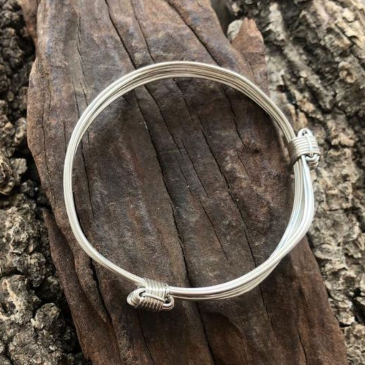 Silver Elephant 2 knot bangle made in Zimbabwe, Africa