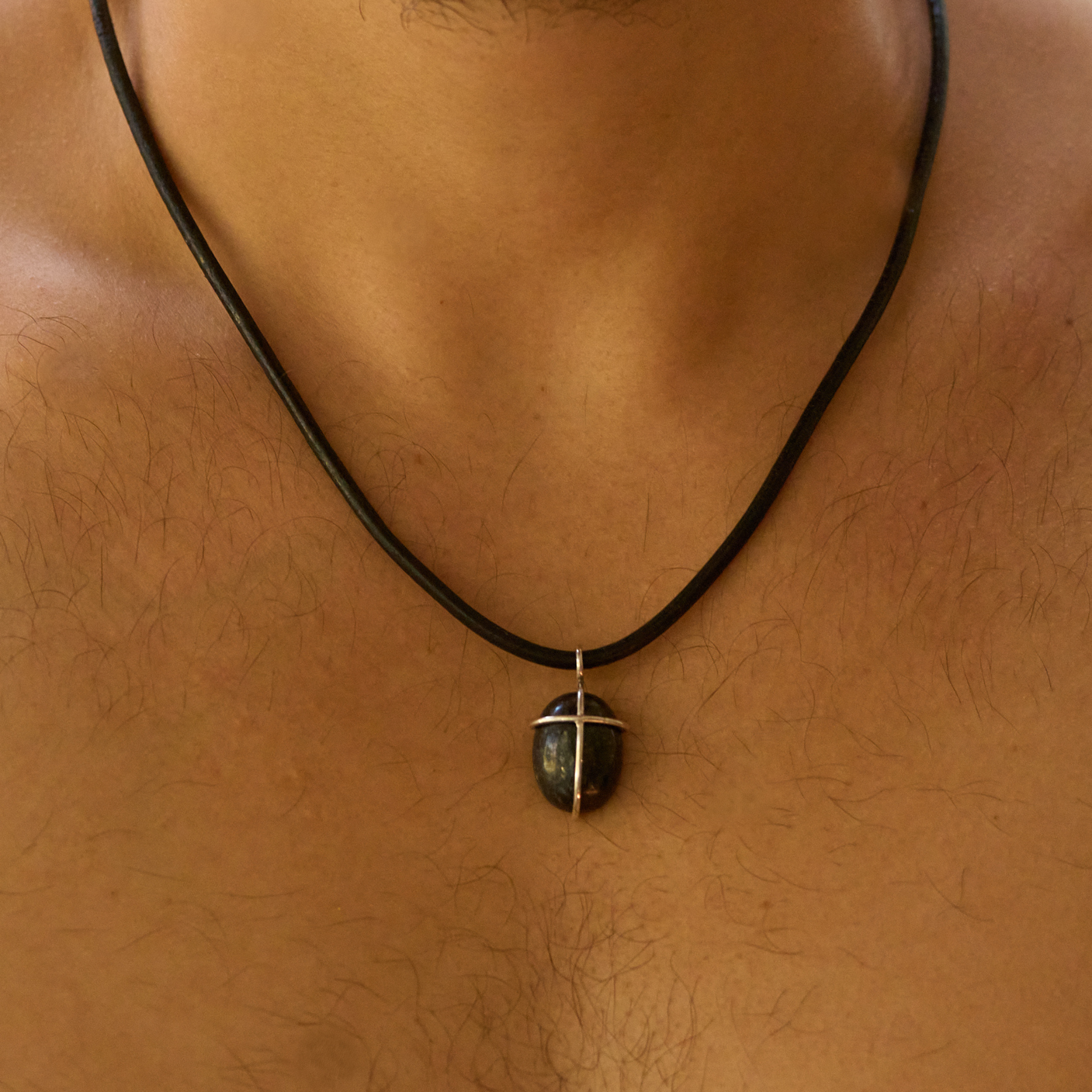 silver Mt Inungu cross with leather made by the Zuri Collection