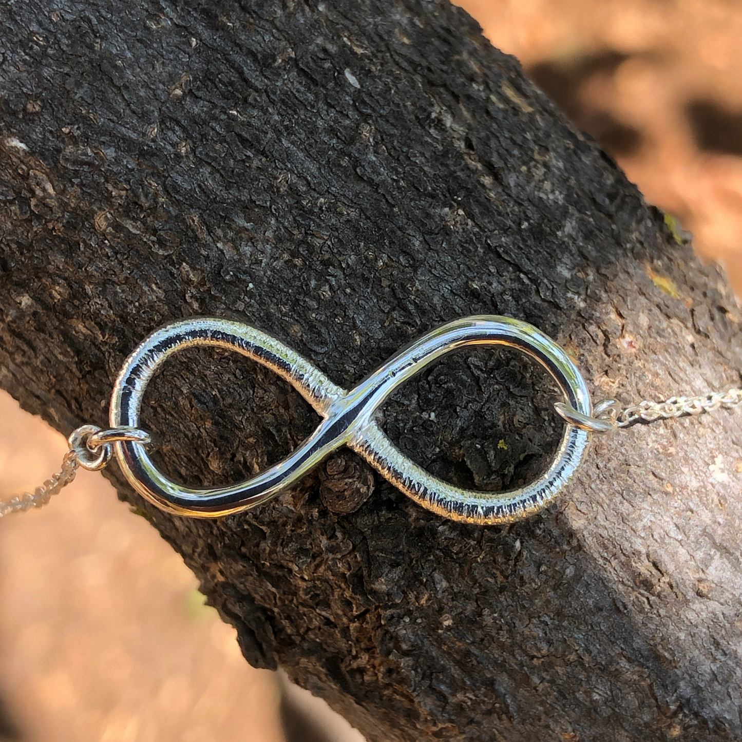 Sterling silver half-brushed infinity necklace