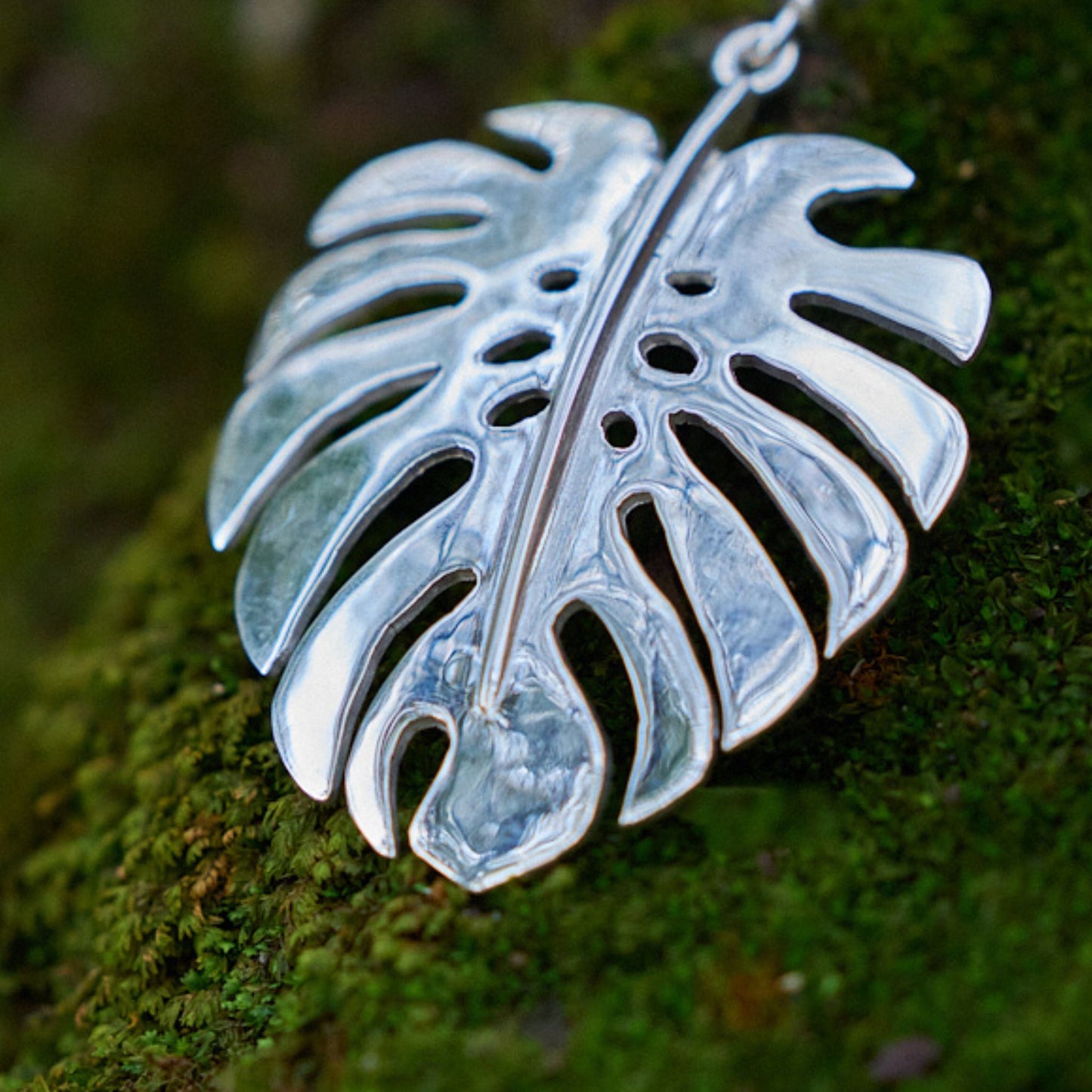 African Handmade Monstera Silver Pendant by The Zuri Collection