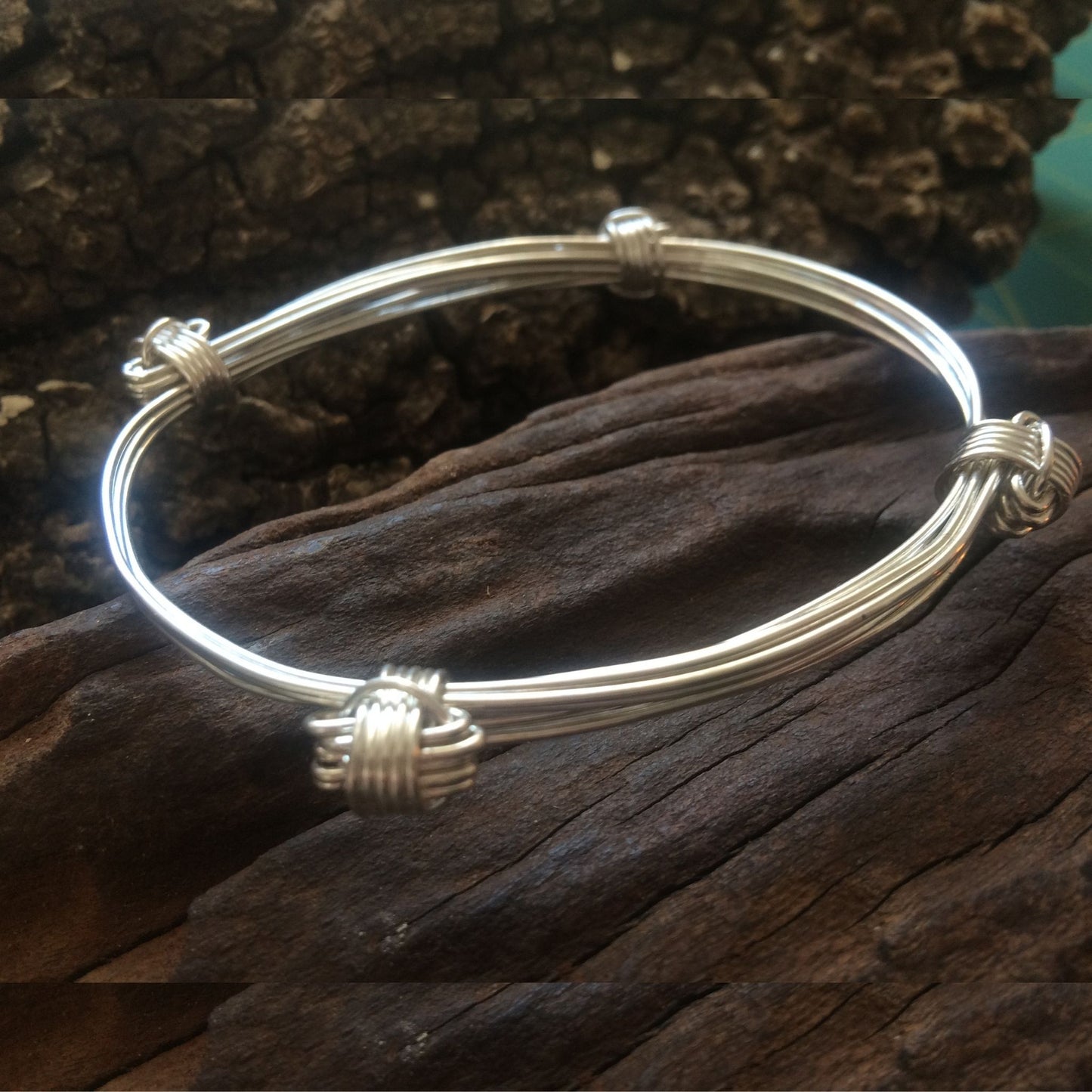 Elephant knot silver Bangle made by the Zuri Collection 