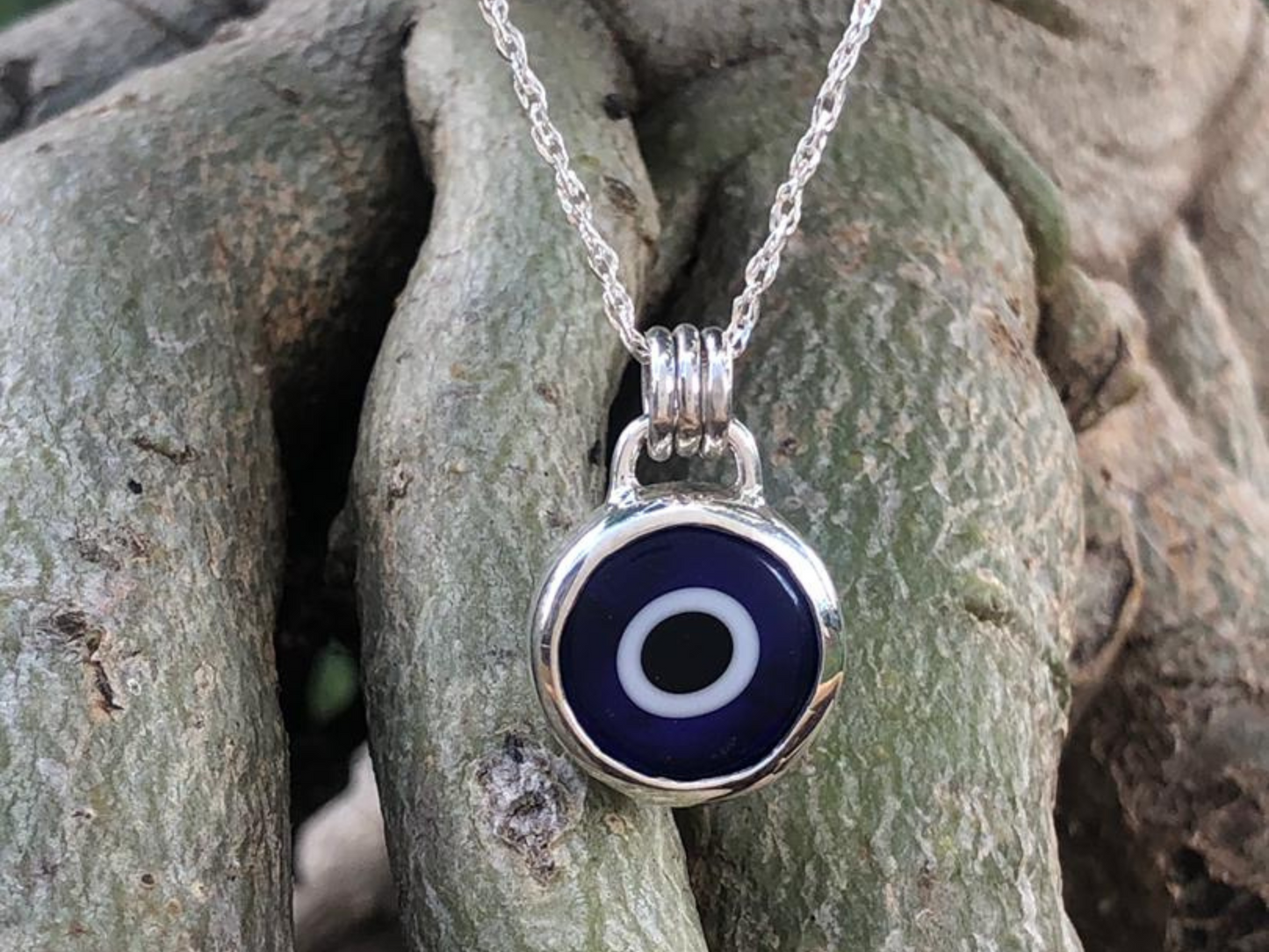 Silver and Turkish evil eye pendant made in Africa