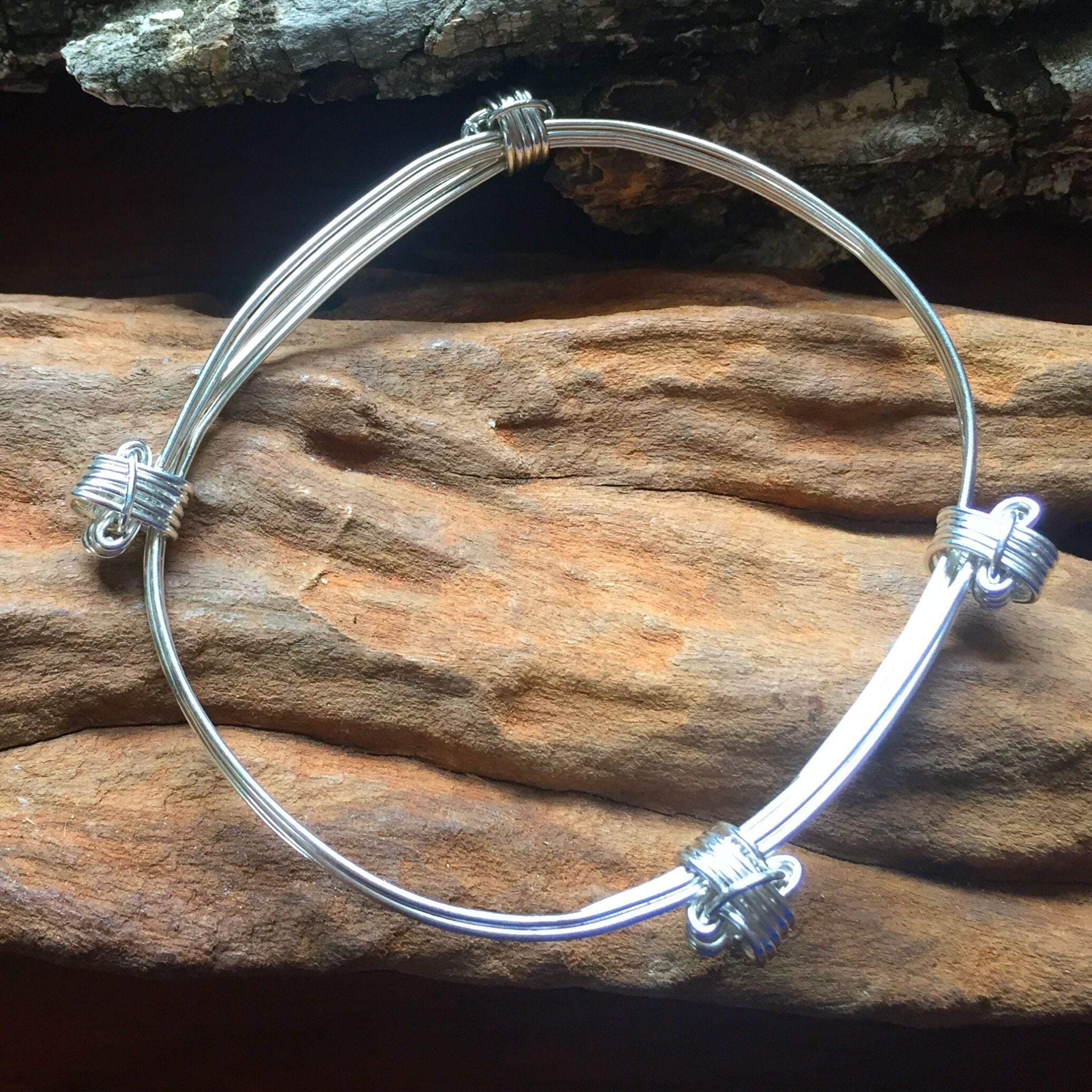 Four Knot 3 Strand Elephant Hair Bangle in Sterling Silver w/ Story Ca –  The Zuri Collection