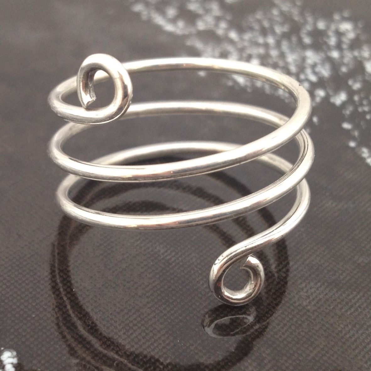 Handmade Silver Spiral Ring made by The Zuri Collection 